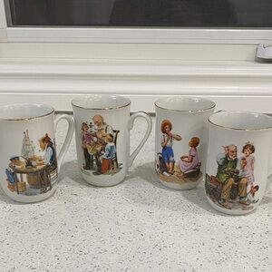Norman Rockwell Illustrated Mugs Set of 4 - White and Gold. Vintage collectibles